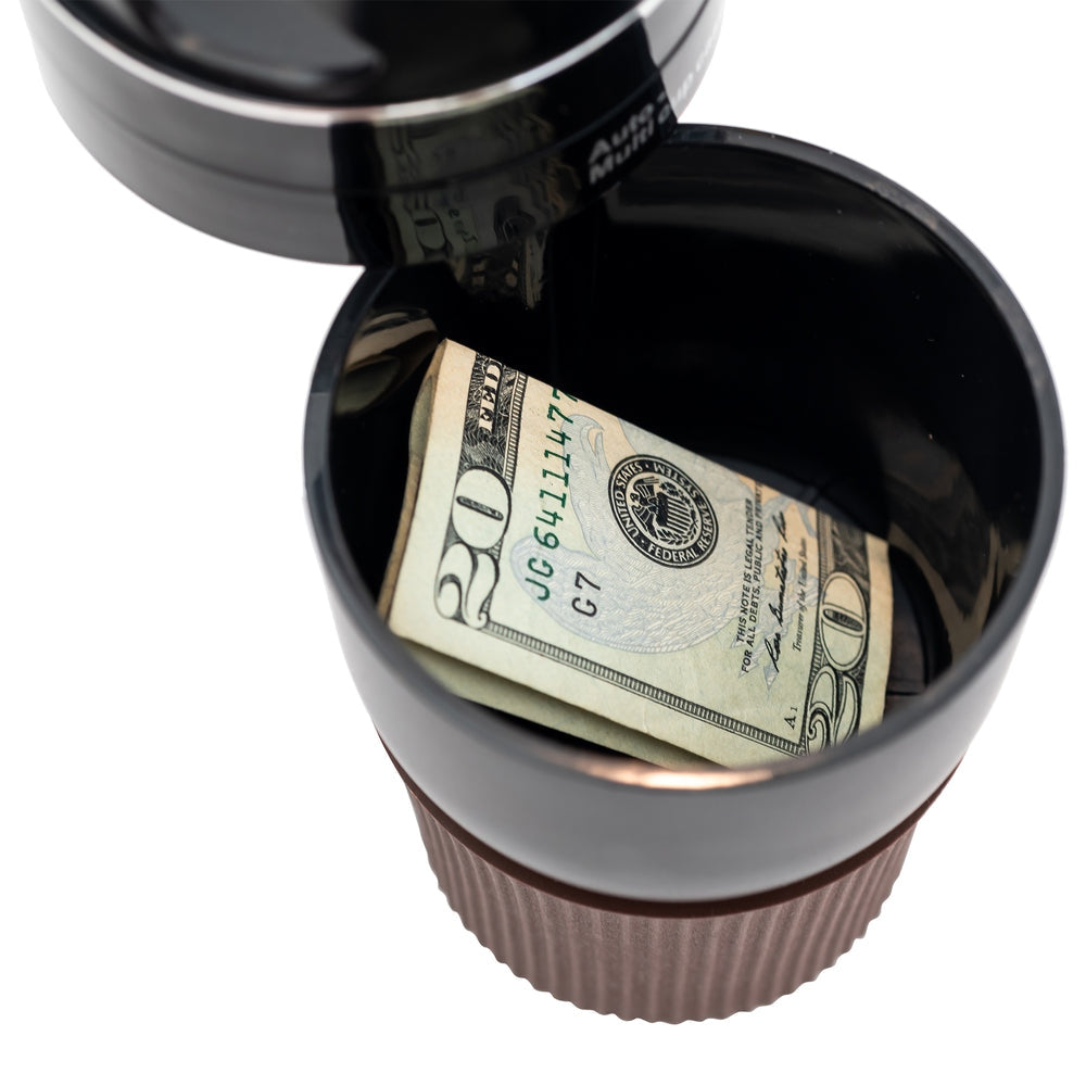Black rotating car caddy with cup holder base and storage space for keys.