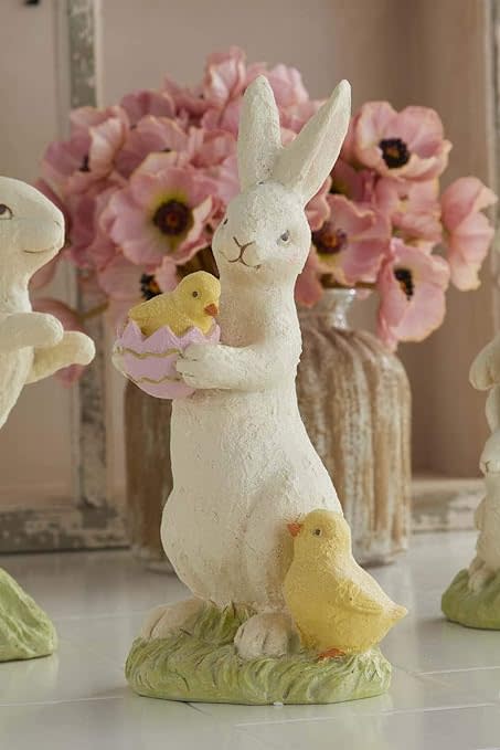 White resin bunny figurine with glitter finish measuring 10.5 inches tall.