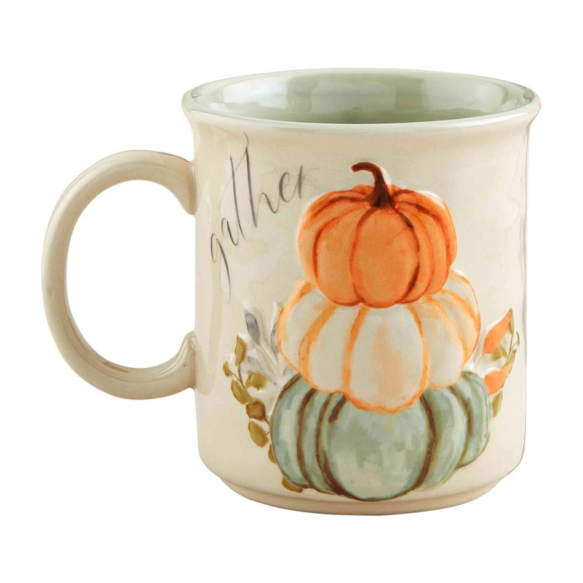 Cream stoneware mug with stacked pumpkins and the word "gather" in script.