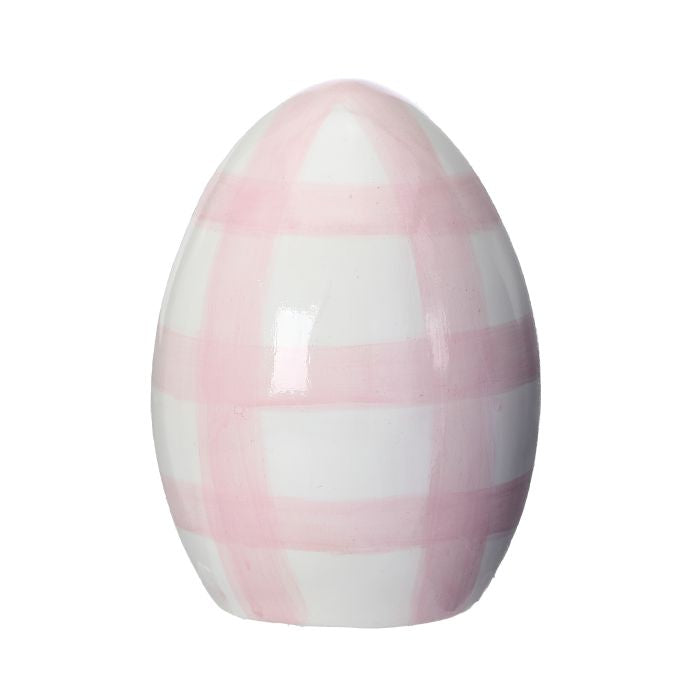 Terracotta check-patterned egg with smooth painted finish