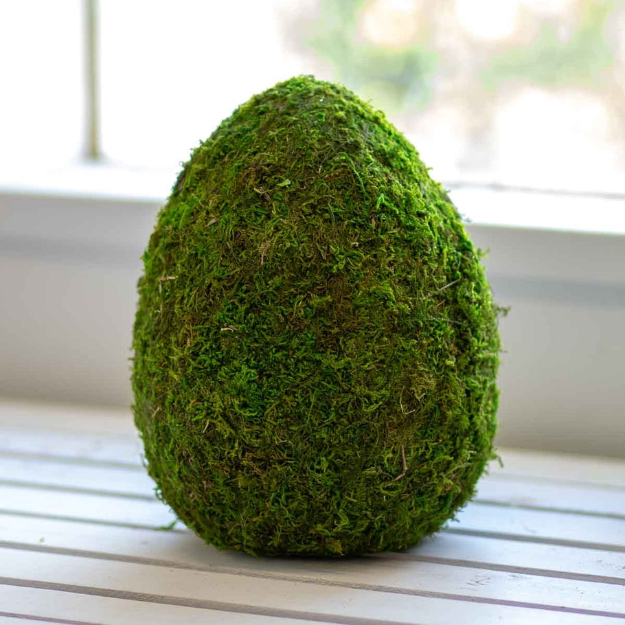 Green moss egg decor with a natural organic shape.