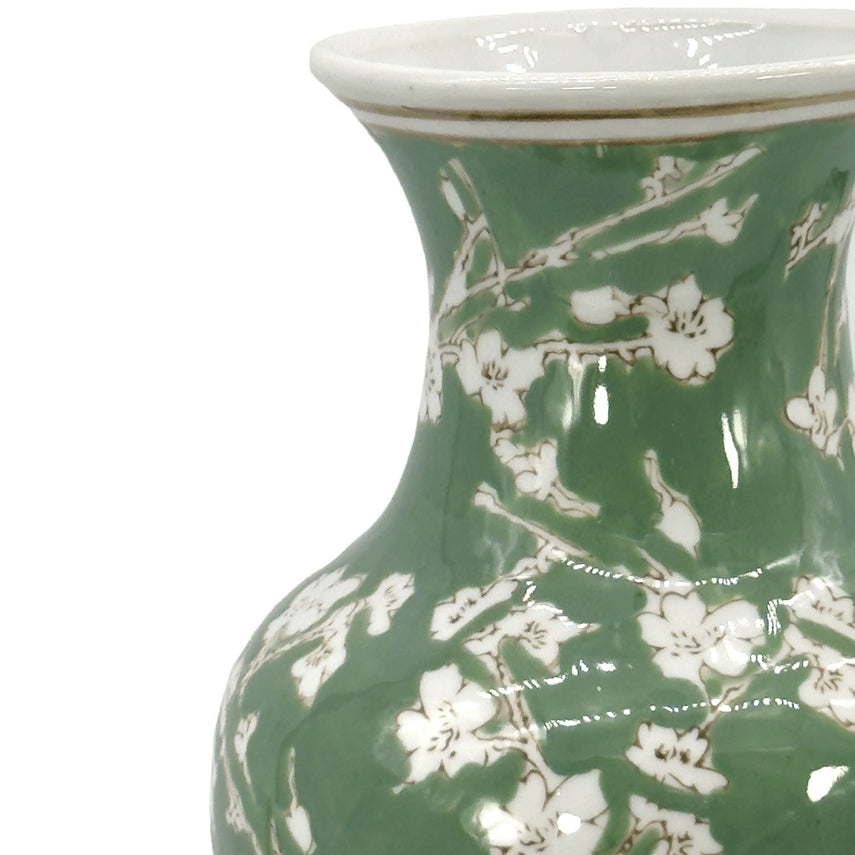 Tall green ceramic vase with white sakura floral chinoiserie pattern