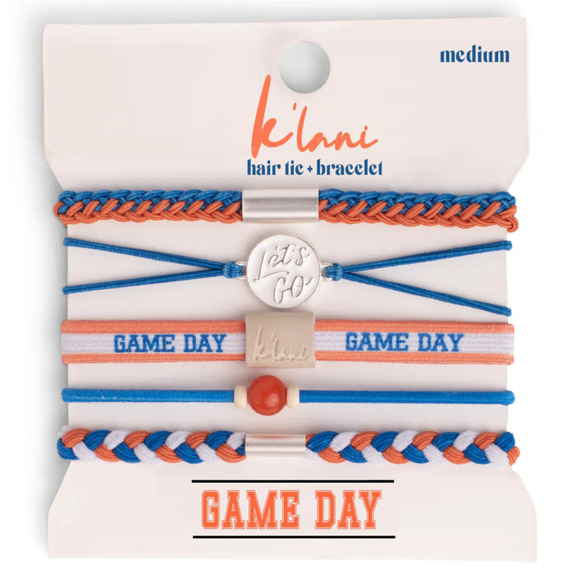 Set of 5 blue and orange Game Day hair tie bracelets with charms on a display card.
