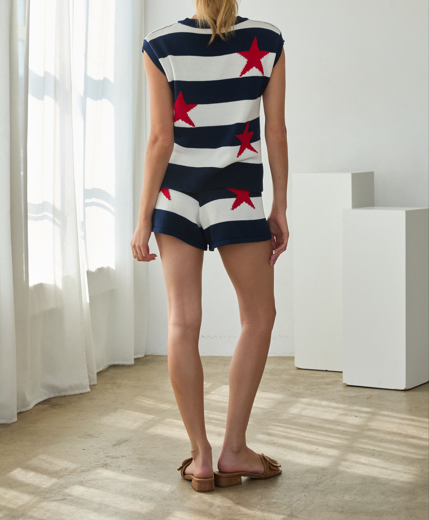 Sleeveless star-stripe sweater top in black with white stripes
