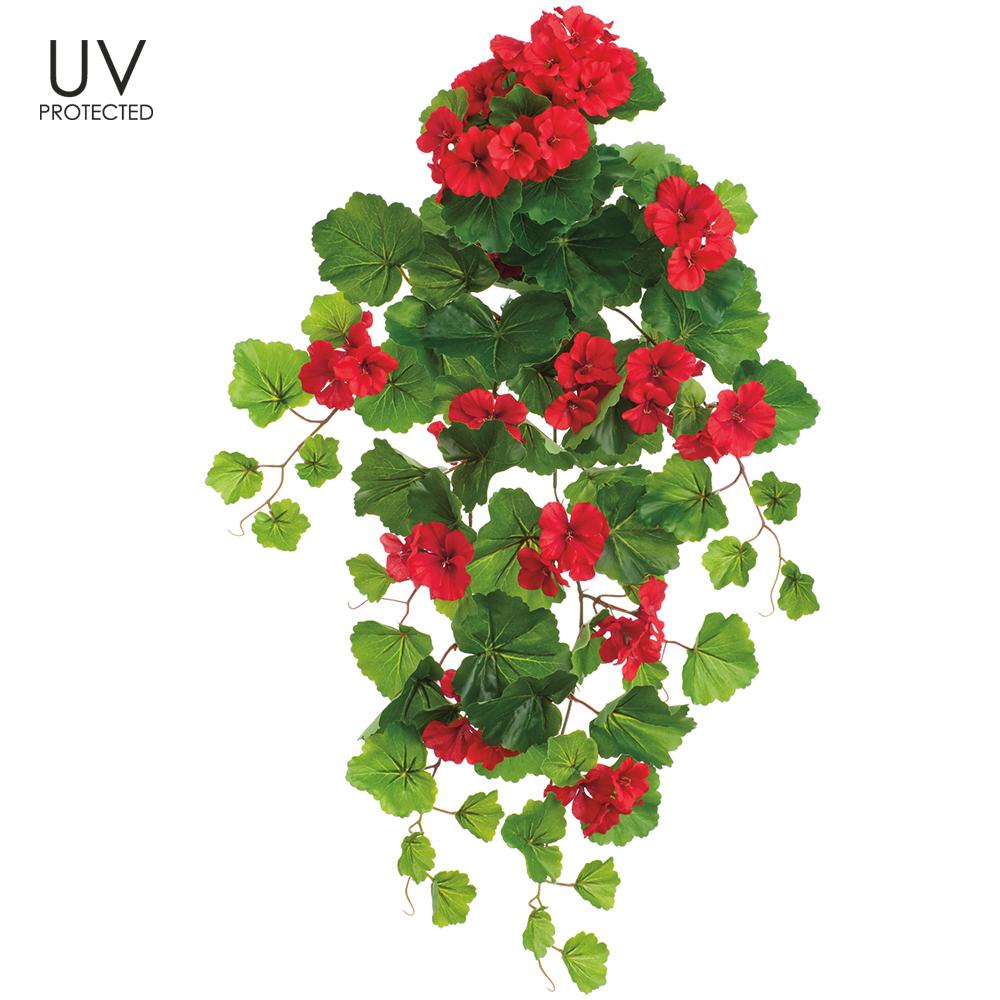Hanging polyester bush with vibrant red geranium blooms on a wire frame