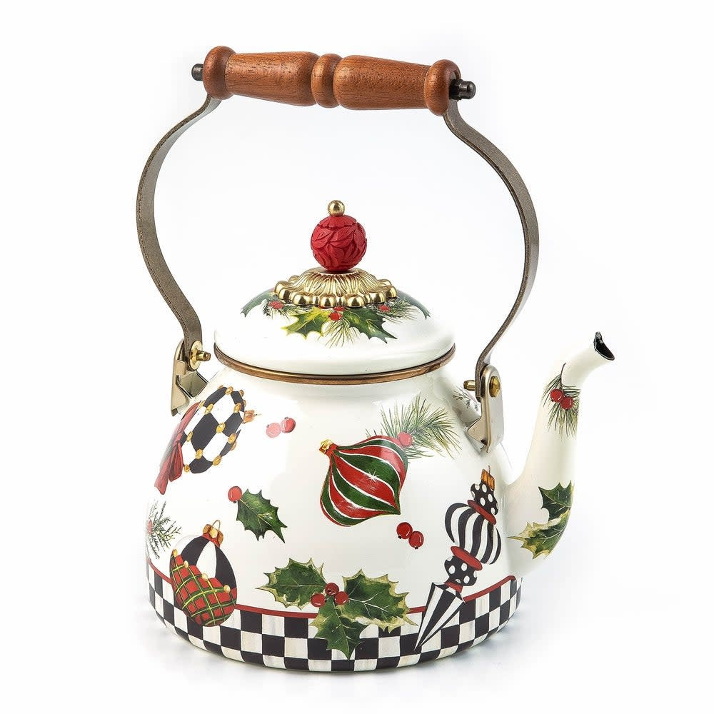 Hand-glazed steel tea kettle with red holiday transfer decoration featuring holly leaves.