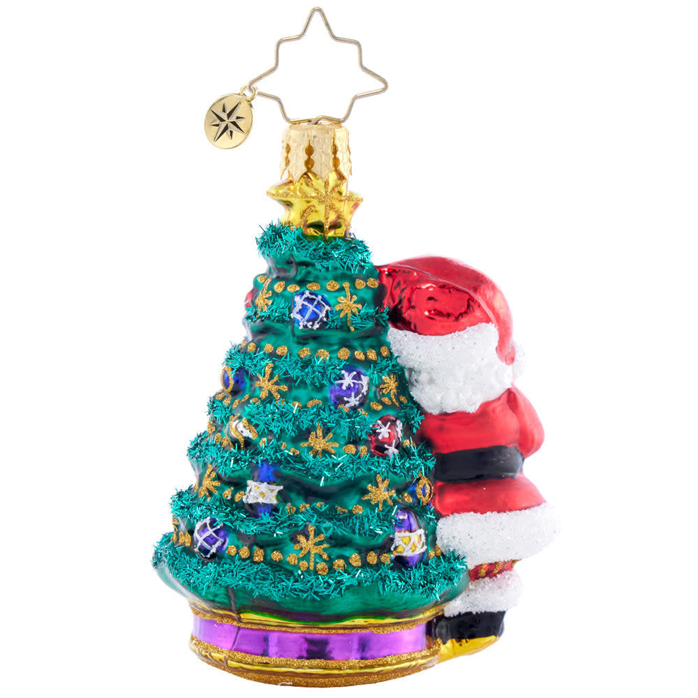 Deck The Halls Santa Gem ornament featuring a festive red Santa figure holding ornaments against a holiday-themed background.