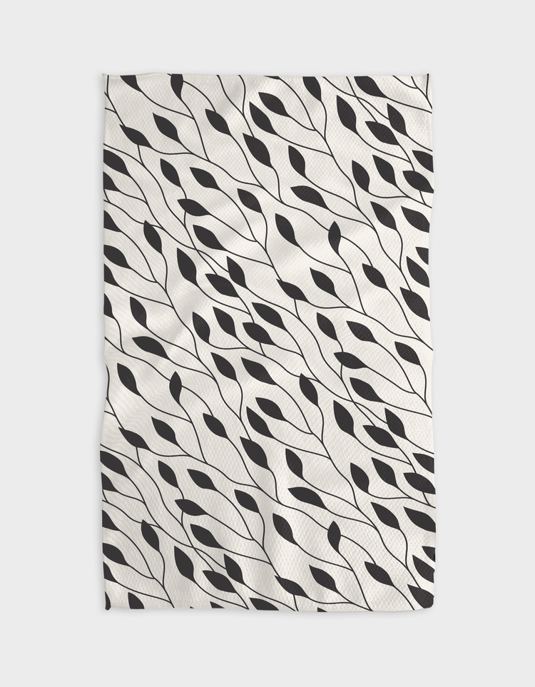 Recycled polyester waffle weave kitchen tea towel with single-sided geometric print