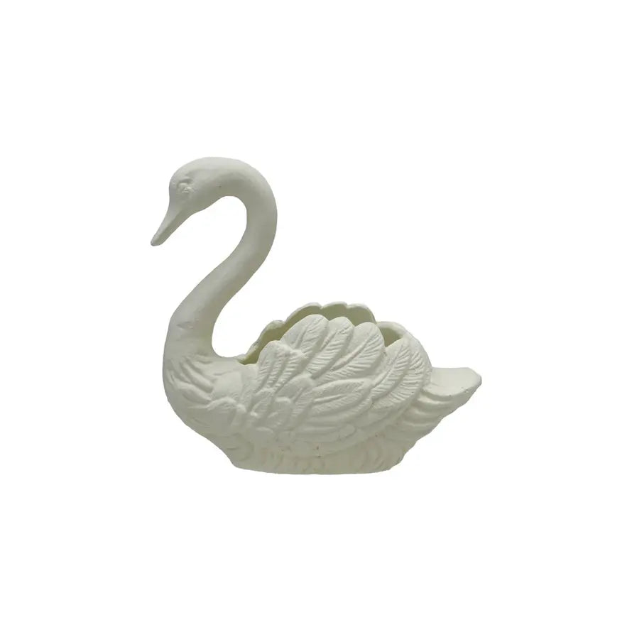 Vintage-style cast iron swan planter in matte black with a decorative silhouette.