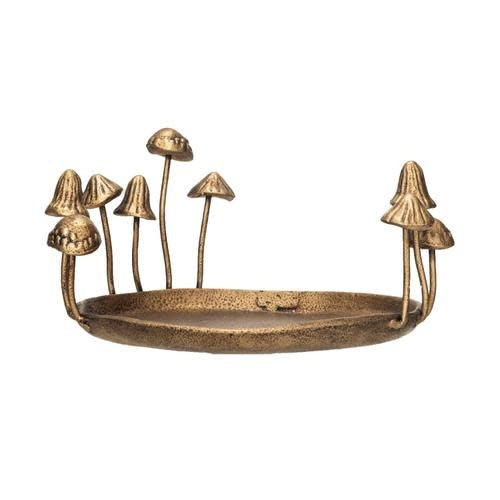 Antique gold cast iron decorative tray featuring mushroom silhouettes with textured metal finish