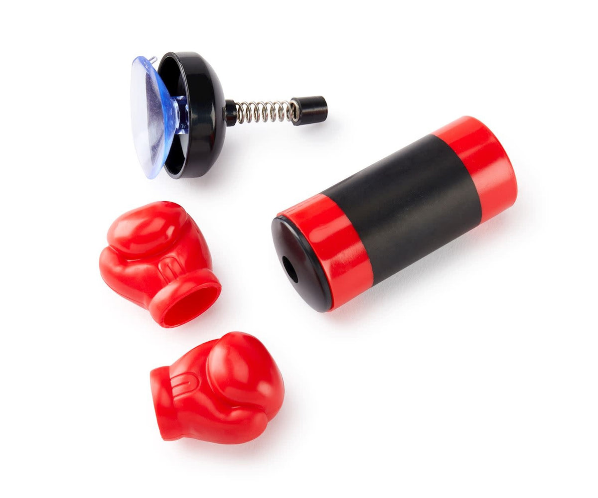 Desktop finger boxing game set with plastic punching bag on steel suction stand.