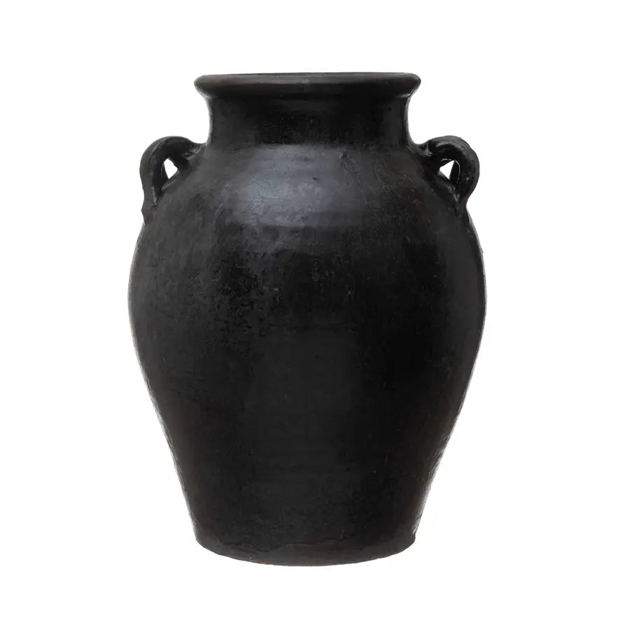 Found decorative clay jar with organic distressed finish in earthy tone