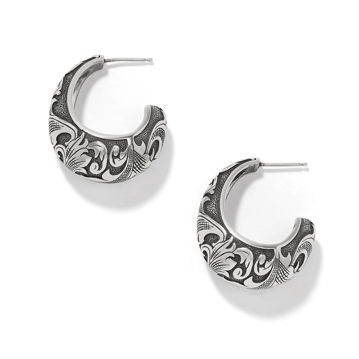 Ferrara Florentine silver hoop earrings with intricate scrollwork and a textured finish.