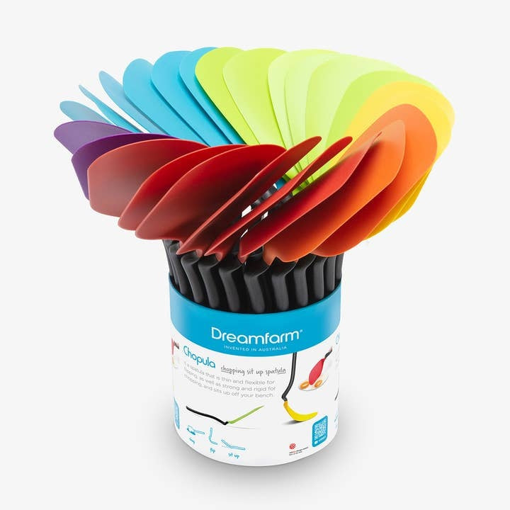 Black nylon Chopula spatula with a thin flexible head designed for flipping and chopping.