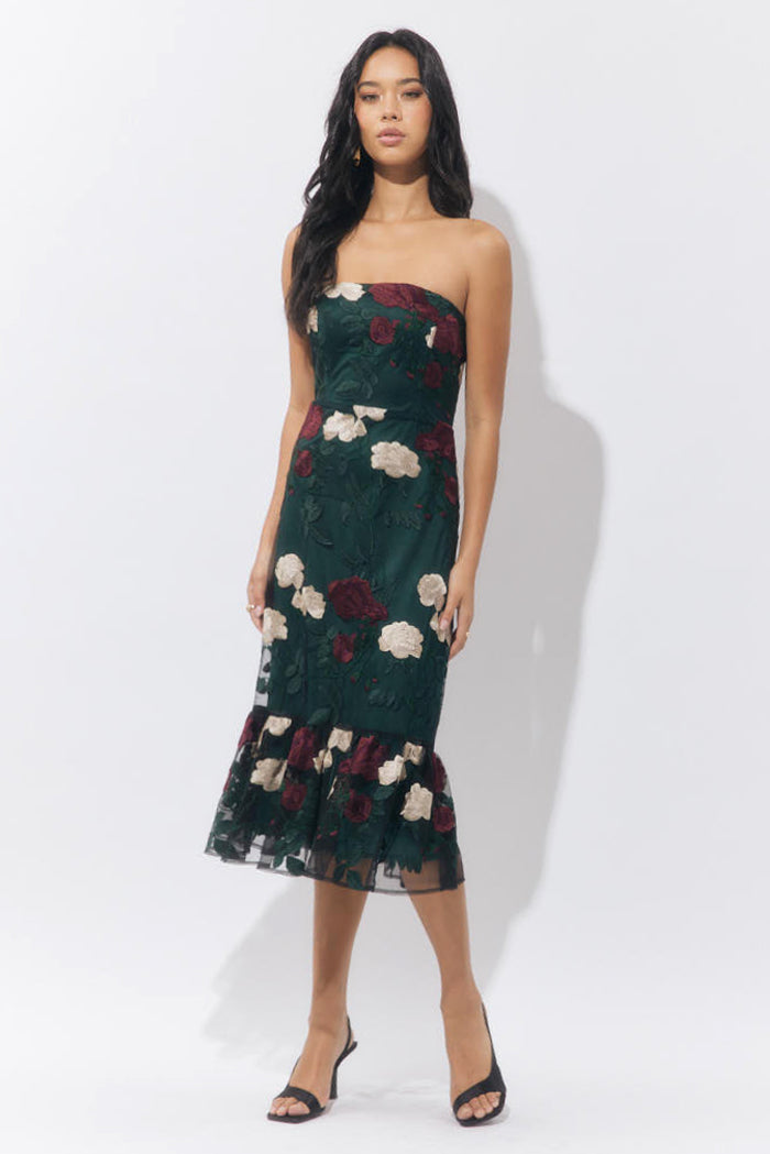 Black strapless mesh dress with floral embroidery featuring a fitted bodice and flared skirt silhouette.