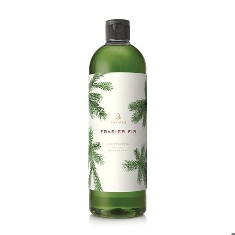 Thymes Frasier Fir Hand Wash Refill in a 24.5 fl oz green bottle with pine needle illustrations.