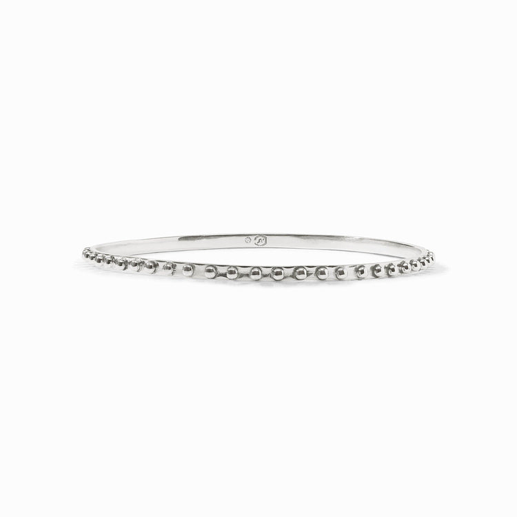 Silver SoHo Bangle featuring a thin band with a row of small, polished metallic beads.