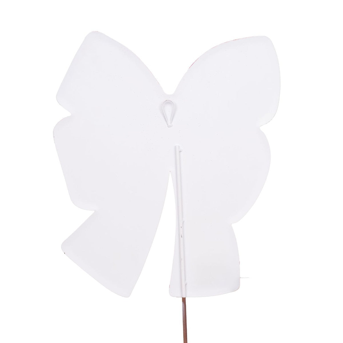 Red fabric bow with white center accent on a stake.