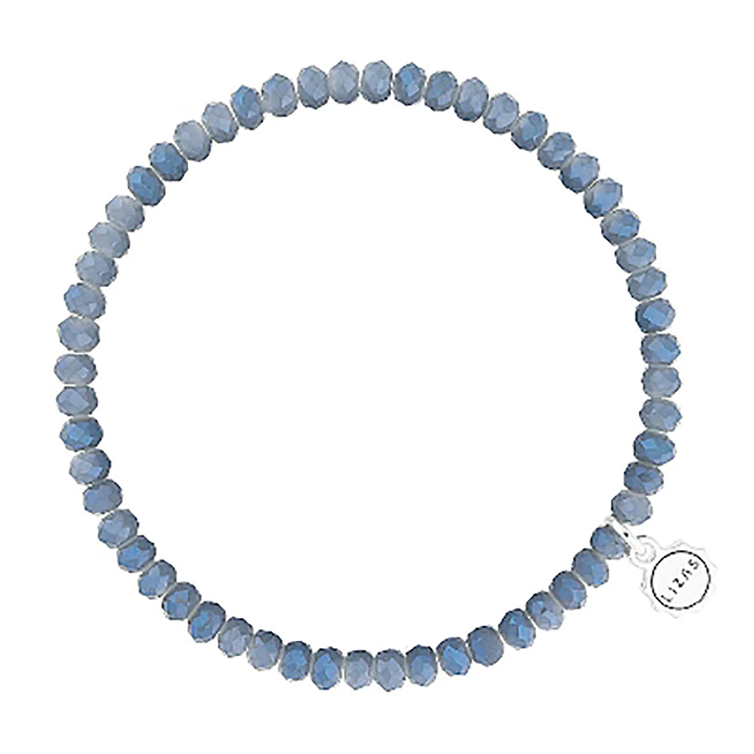 Lizas Quadro Big crystal stretch bracelet in light blue with a silver logo charm.