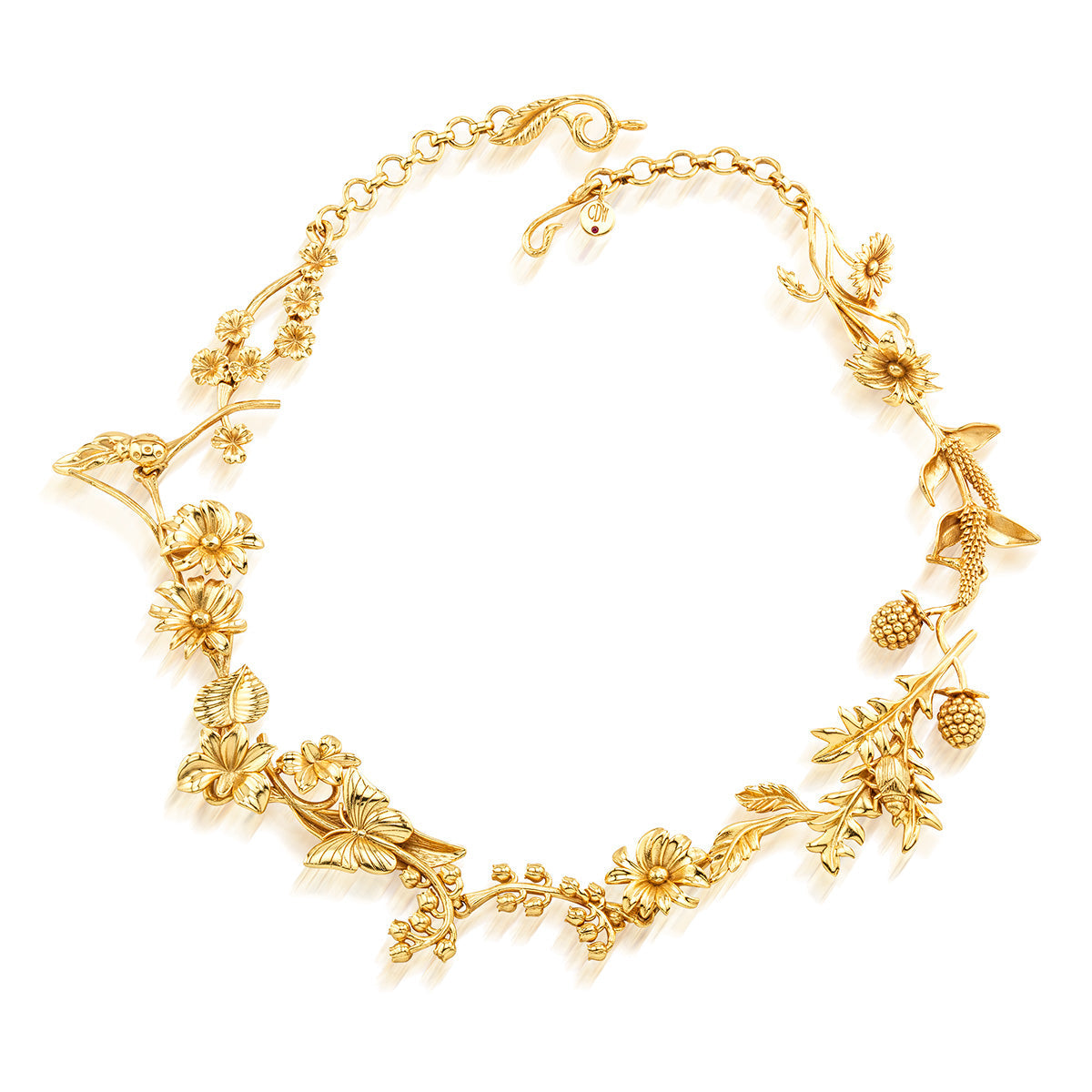 Gold plated brass necklace featuring a meadow wildflower pendant on an 18-inch chain.