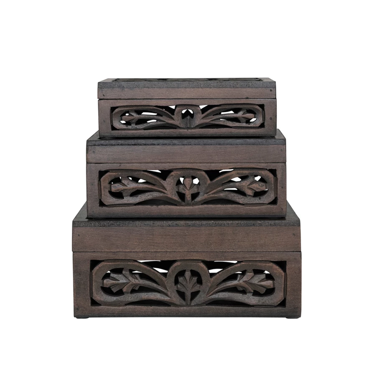 Set of three nesting boxes carved from MDF with mango wood accents in a natural finish.