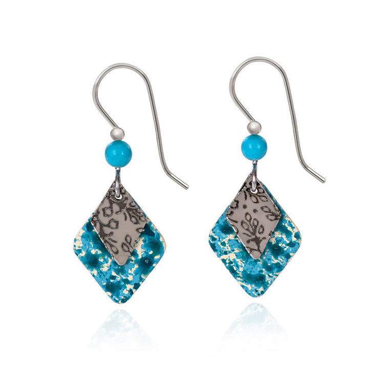 Layered blue crackle enamel earrings with silver paisley patterns and a blue quartz bead accent.