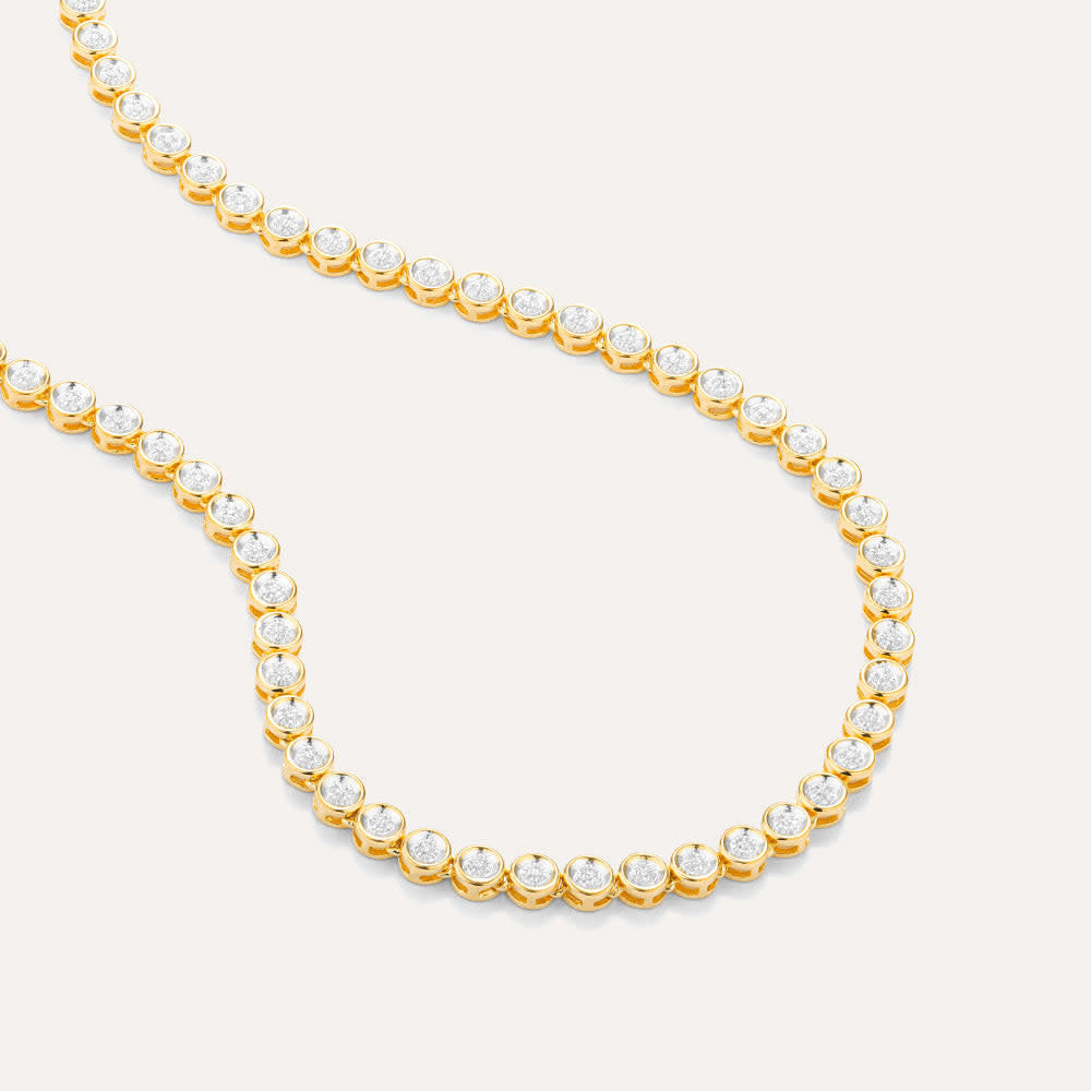 Diamond tennis necklace with a continuous row of genuine diamonds on an 18-inch chain featuring a lobster clasp.