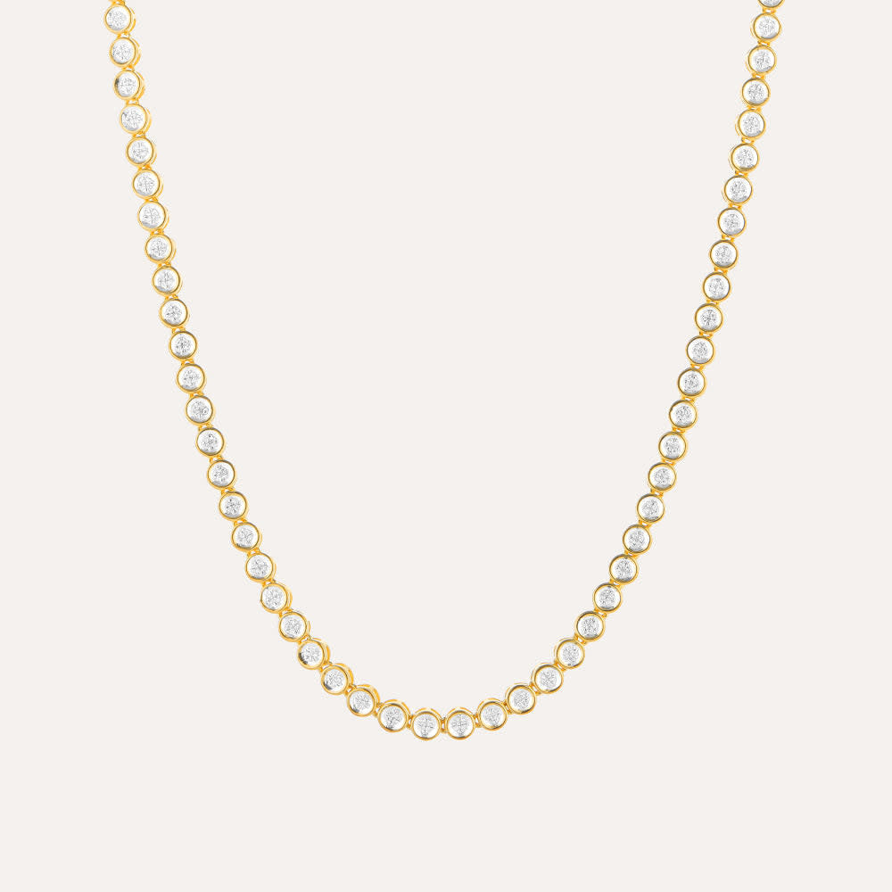 Diamond essential tennis necklace with continuous row of diamonds on a silver chain.