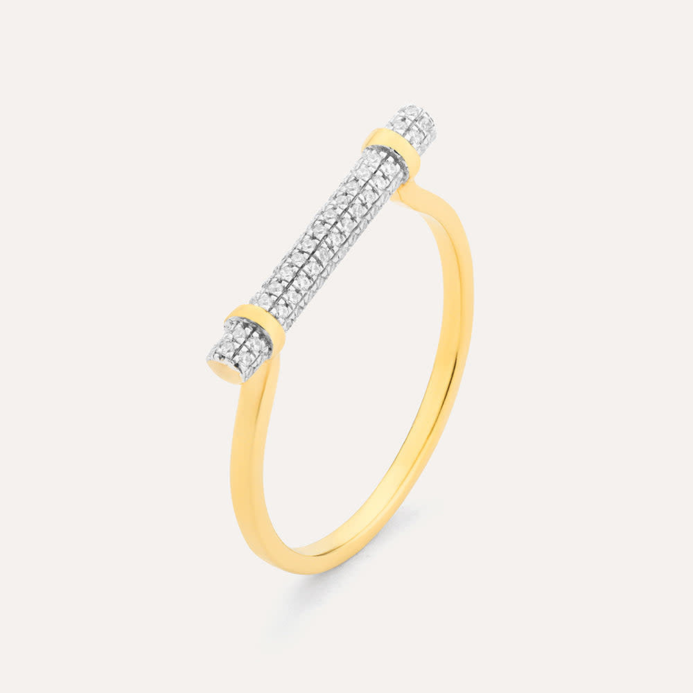 Sterling silver ring with gold plating featuring a central diamond log-shaped stone in a three-prong setting.