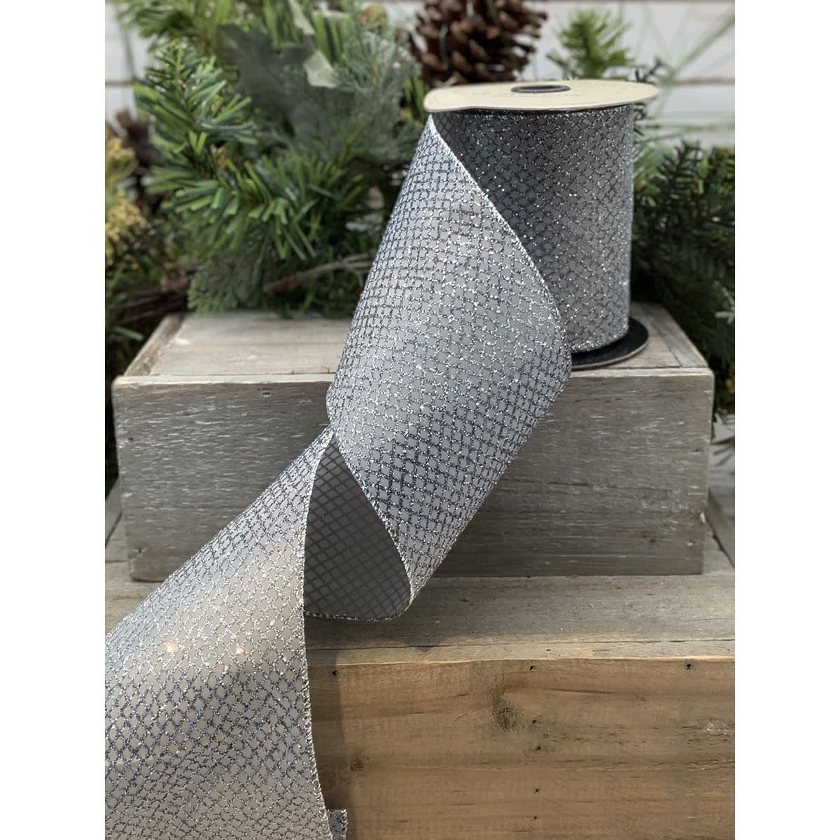 Silver metallic diamond mesh ribbon with a shimmering geometric texture.