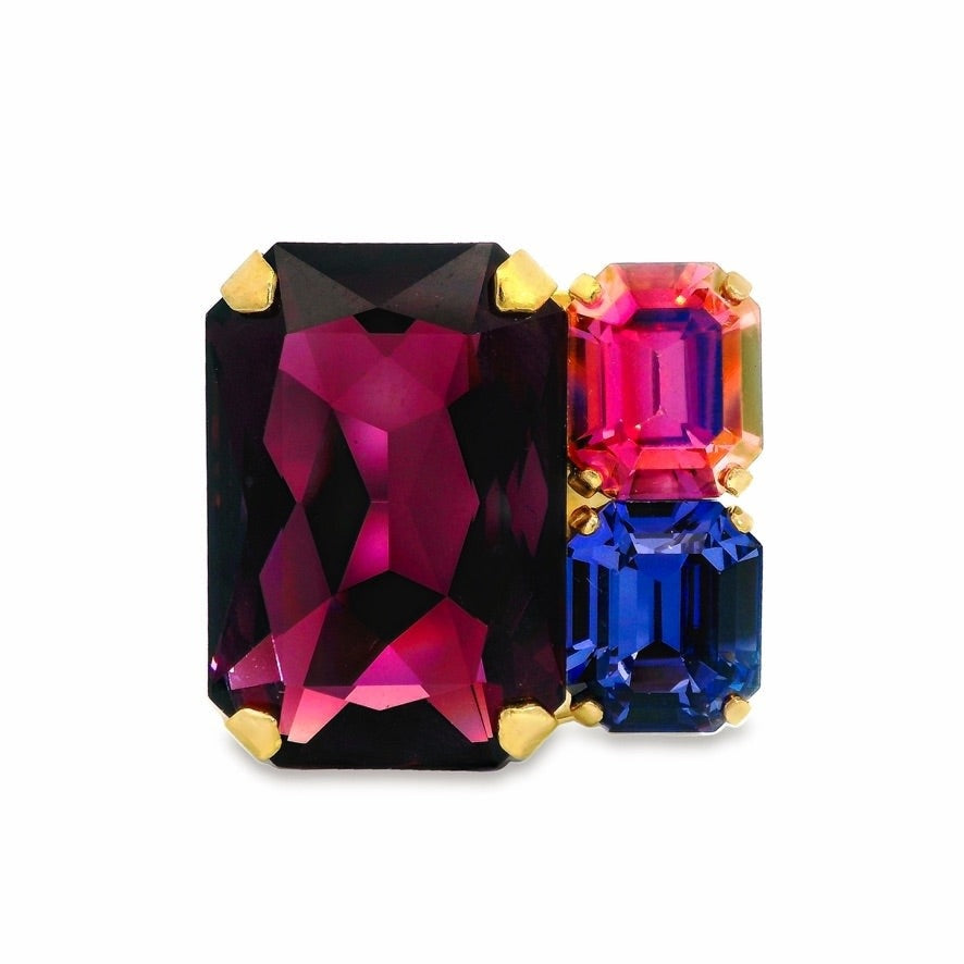 Antique gold plated brass Diana ring with adjustable band featuring a central amethyst crystal.