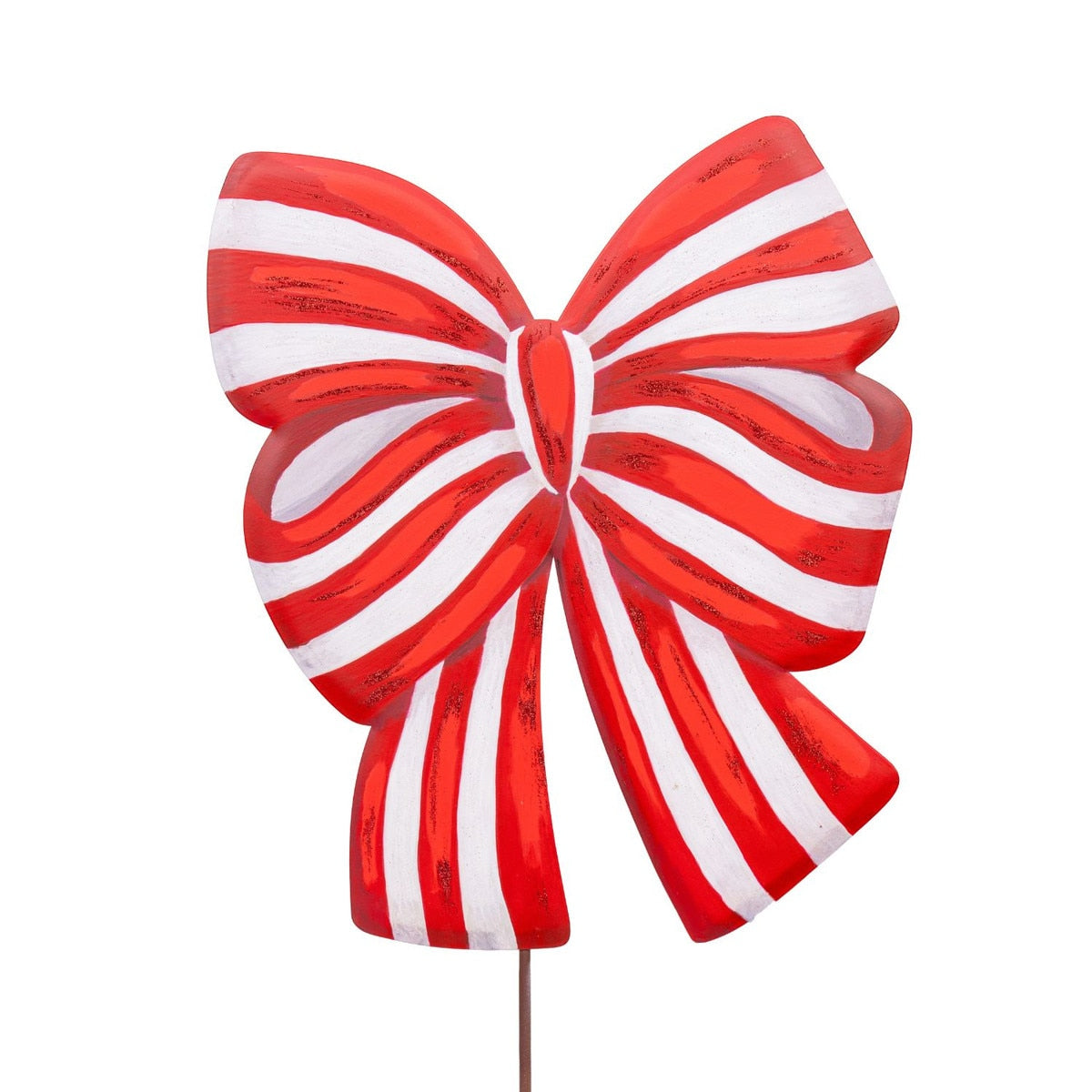 Red fabric bow with white center on a stake