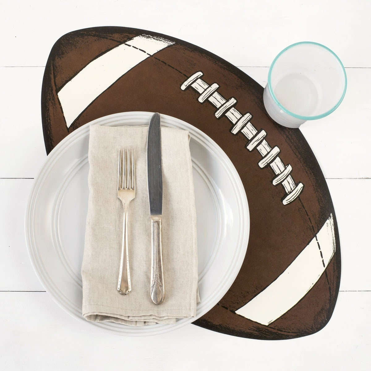 Set of twelve die-cut football-shaped placemats in green with white yard lines and numbers.