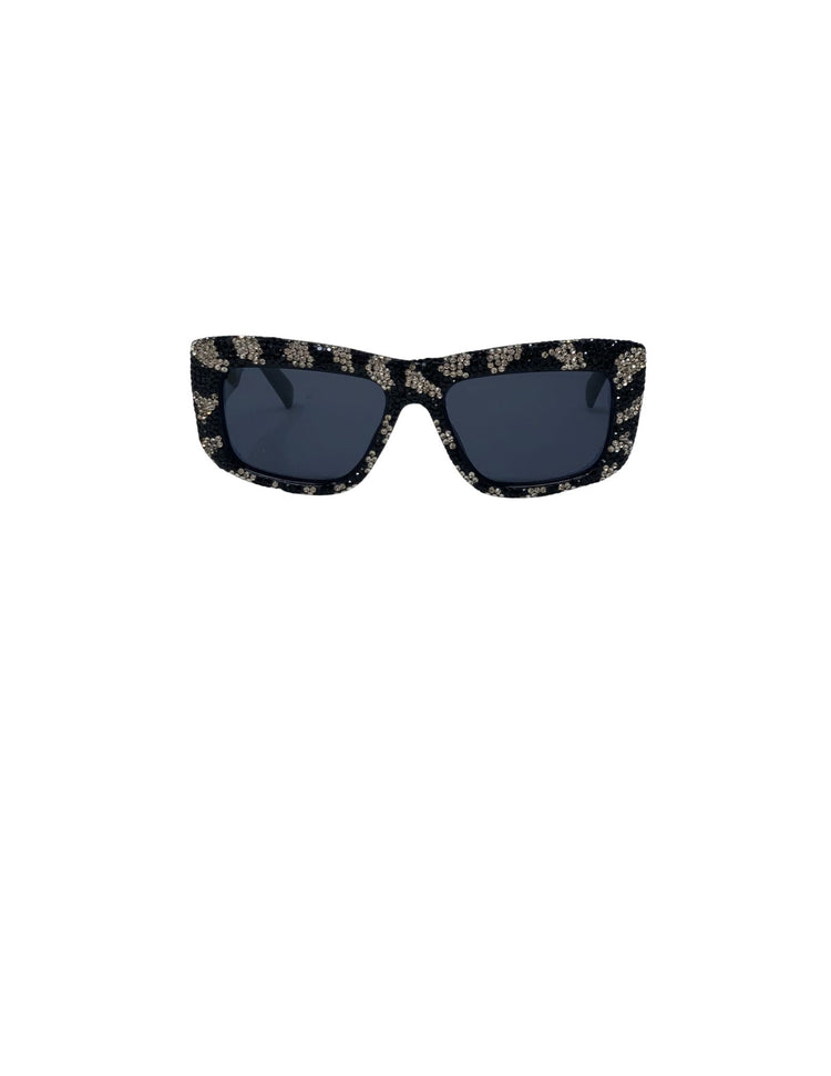 Black rectangular sunglasses with leopard print rhinestone embellishments and dark lenses.