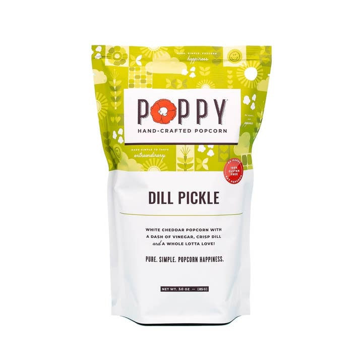 Front view of Market Bag Popcorn in white cheddar vinegar dill flavor with visible seasoning.