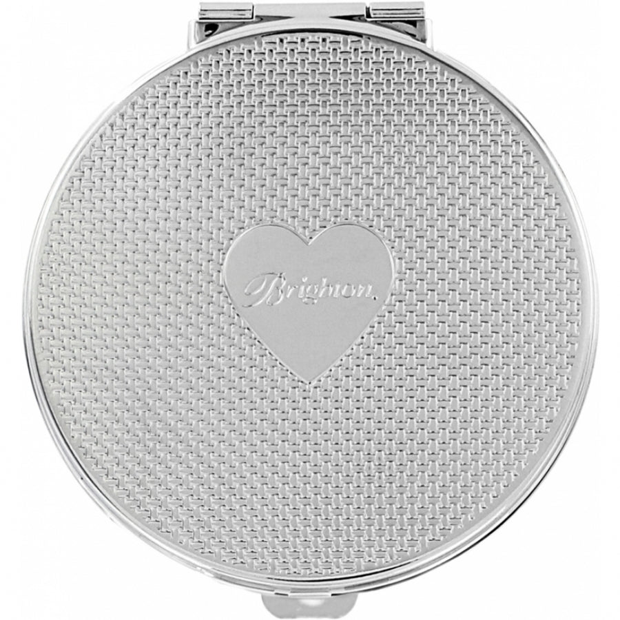 Silver-plated compact mirror with red accents, clasp closure, and side magnification.