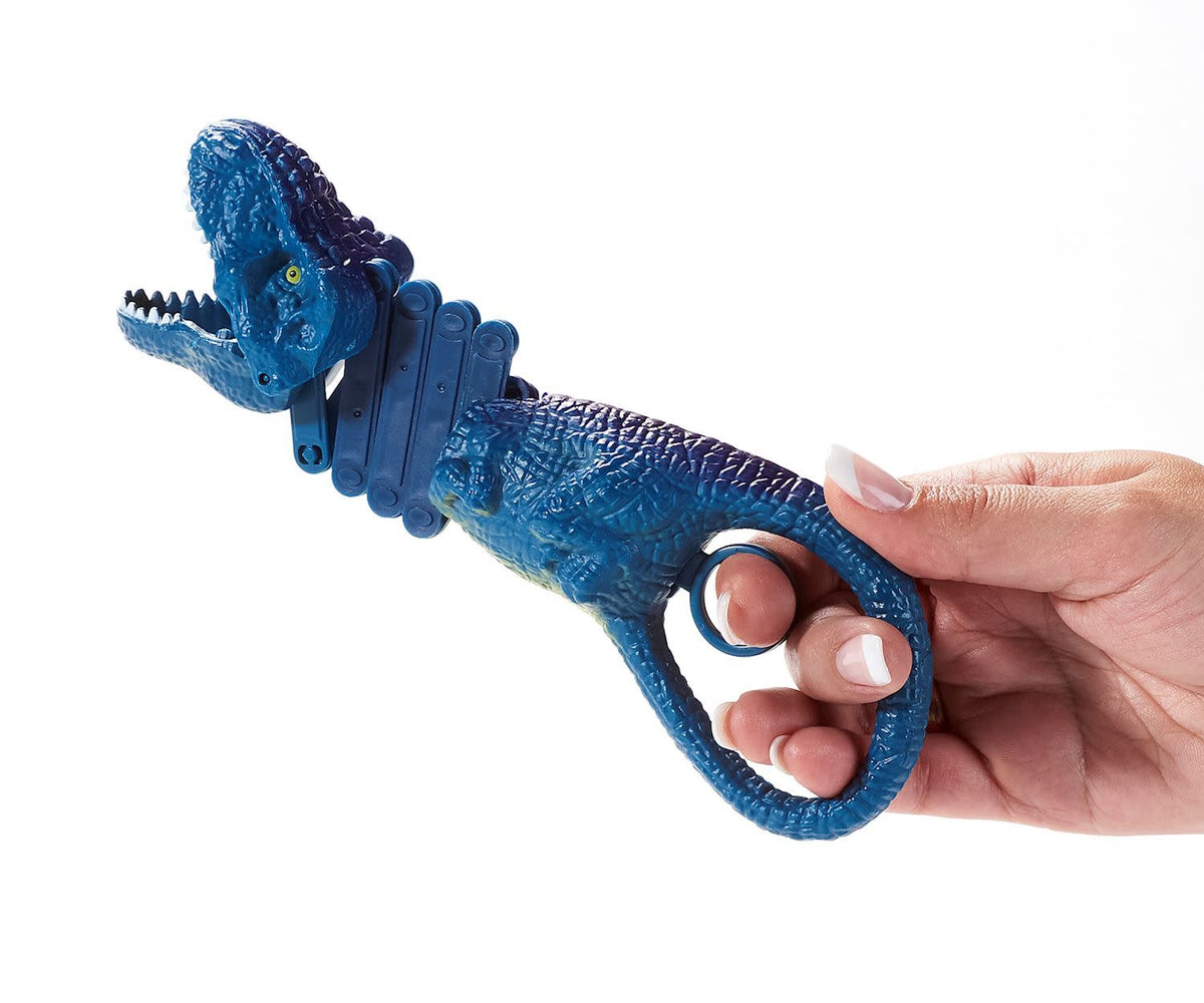 Green plastic dinosaur toy with an open mouth designed to grab small objects.