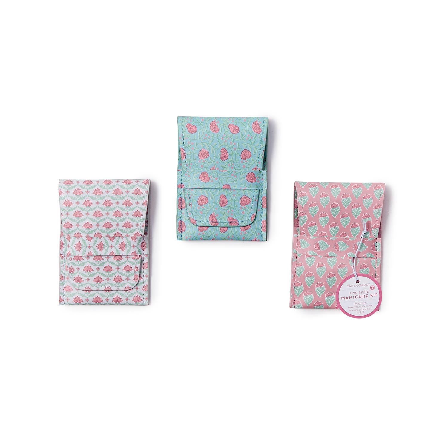 Floral block print manicure kit with stainless steel tools in a vegan leather case.