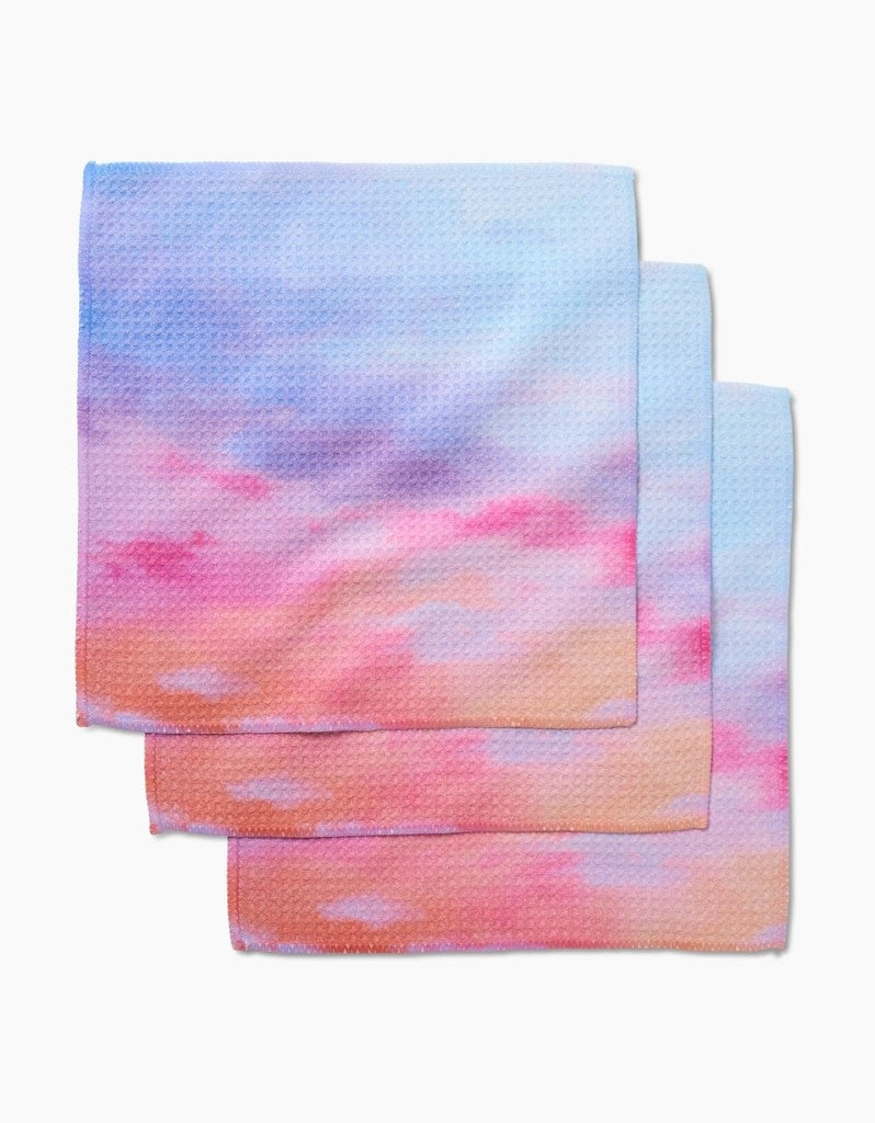 Set of three waffle weave dishcloths in Magic in the Sky pattern made from recycled polyester with hang loops.