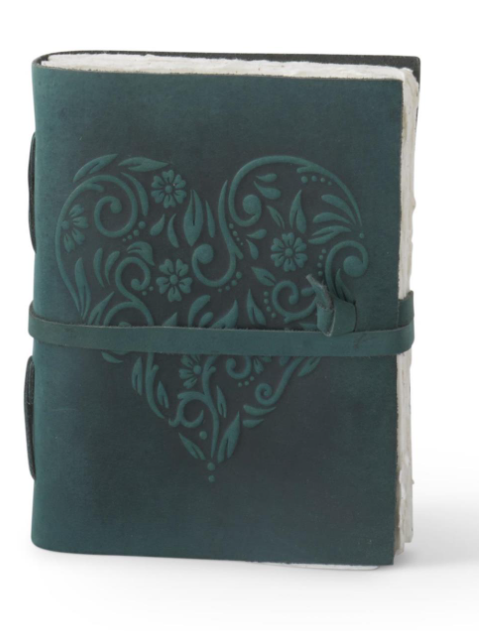 8 inch dark teal leather journal with an embossed floral heart design and a wrap-around strap.