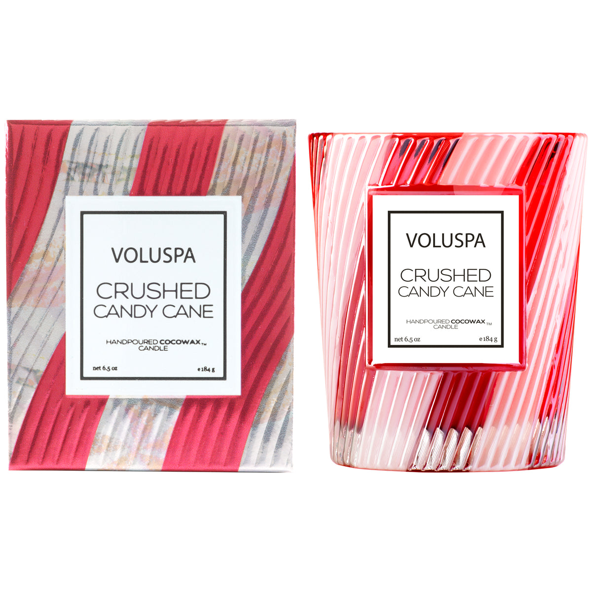 Voluspa Crushed Candy Cane 6.5 oz candle in a red and white striped glass jar next to its box.