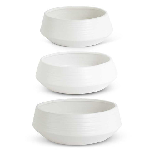 Matte white stoneware saucer planter with wood accents