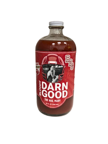 32 oz bottle of Bloody Darn Good The Hail Mary bloody mary mix with a red football helmet label.