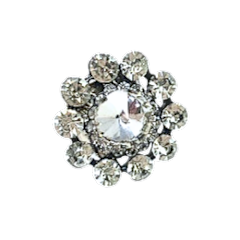 Silver tone stretch ring with clear rhinestone floral cluster