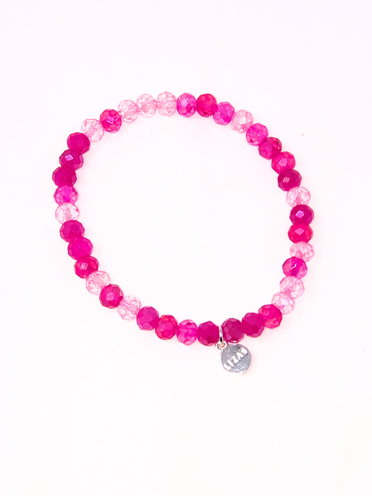 Stretchy beaded bracelet with faceted glass beads in a colorful pattern.