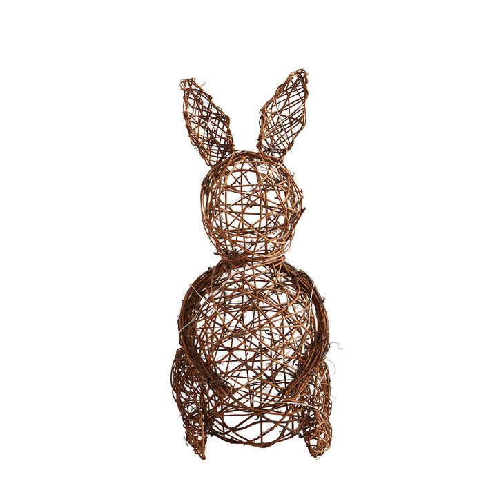 Rattan LED bunny sitter with glowing eyes in a seated pose