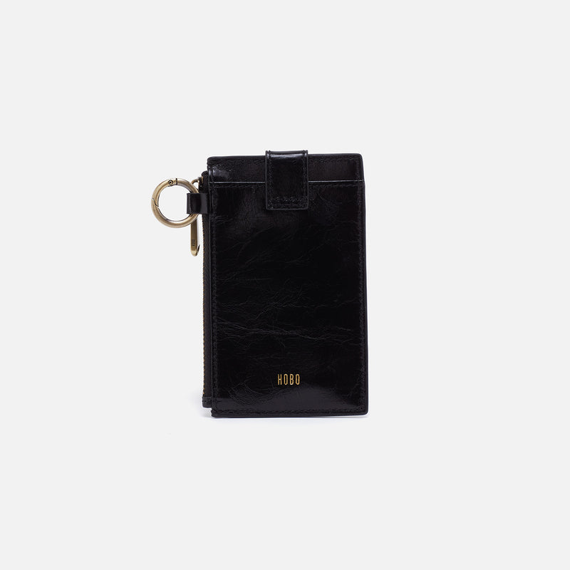 Black leather Ring Credit Card Wristlet with gold HOBO logo and antique brass hardware.