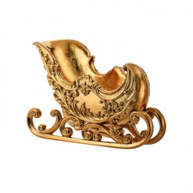 15-inch gold resin sleigh with ornate scrollwork and sculpted details on a white background.