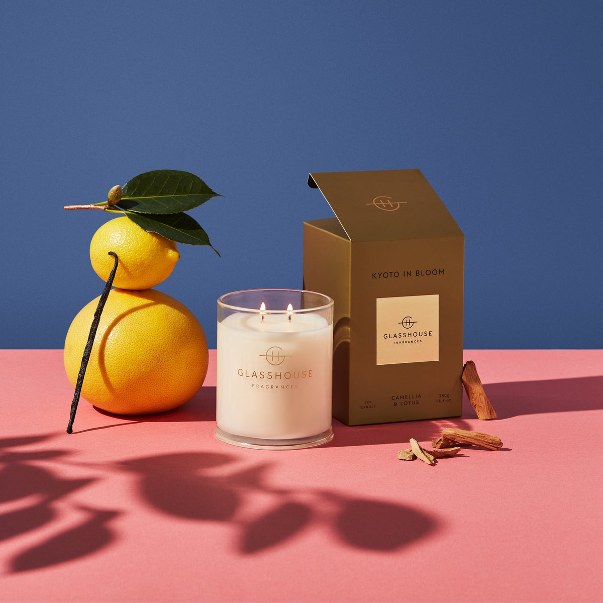 Kyoto in Bloom candle with amber wax, floral scent notes, and a glass jar silhouette.