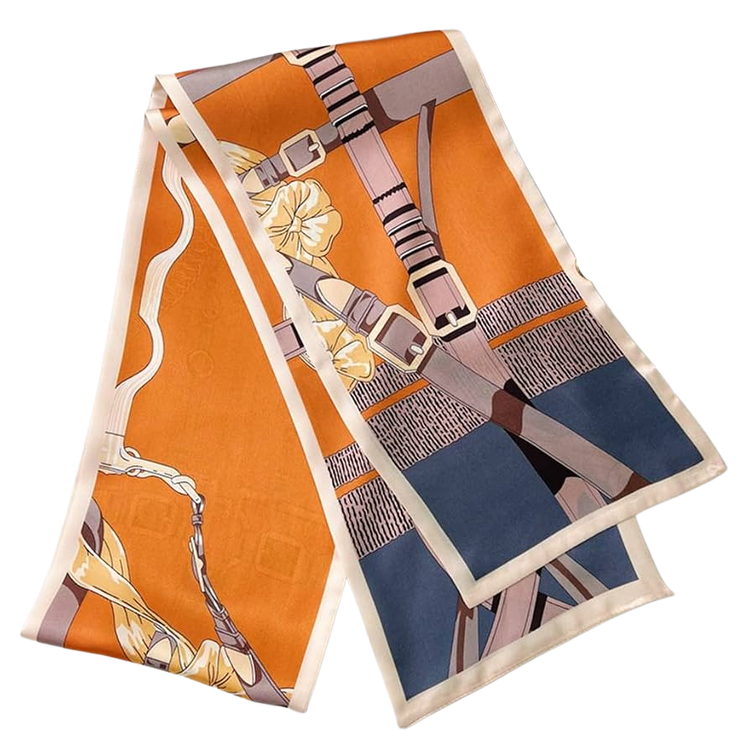 Slim reversible silk scarf with orange and blue equestrian buckle and floral print.